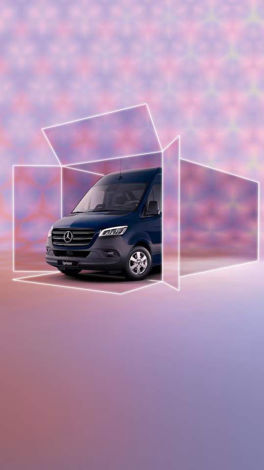 The Mercedes-Benz Vito Tourer is parked in front of a glass building.