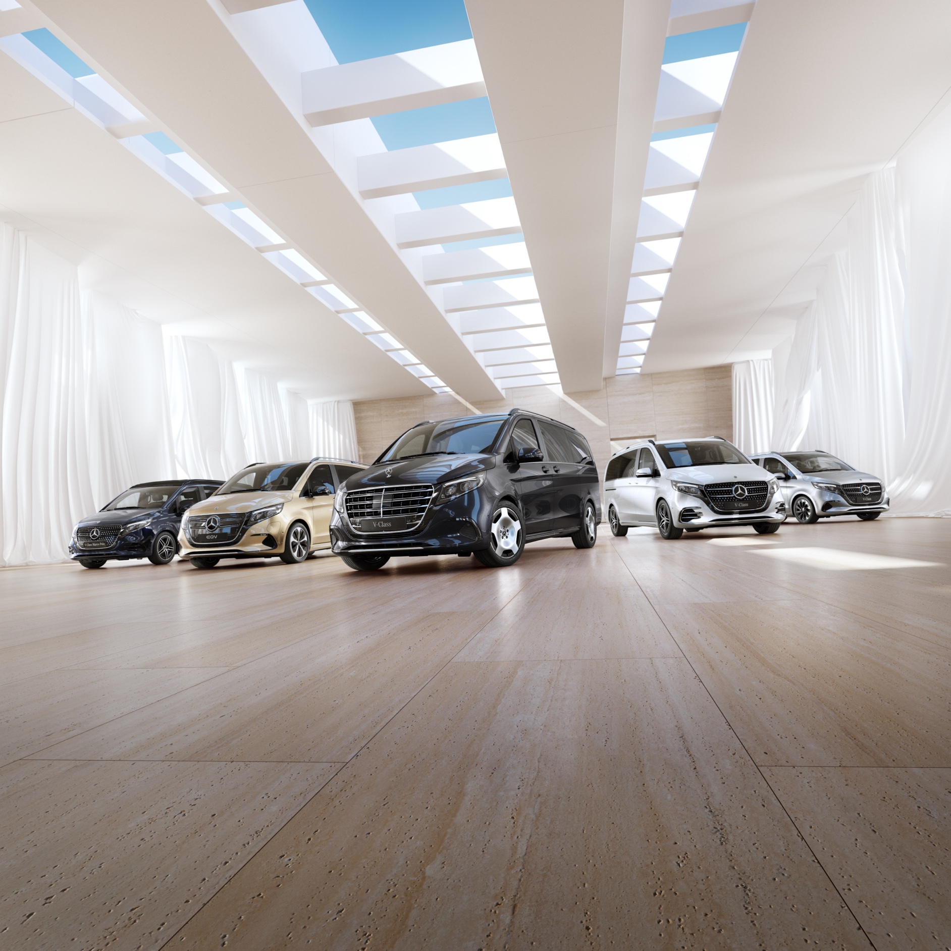 Confort | EQV | Mercedes-Benz Vans Les modèles de monospaces et de camping-cars Mercedes-Benz sont présentés dans un show-room.