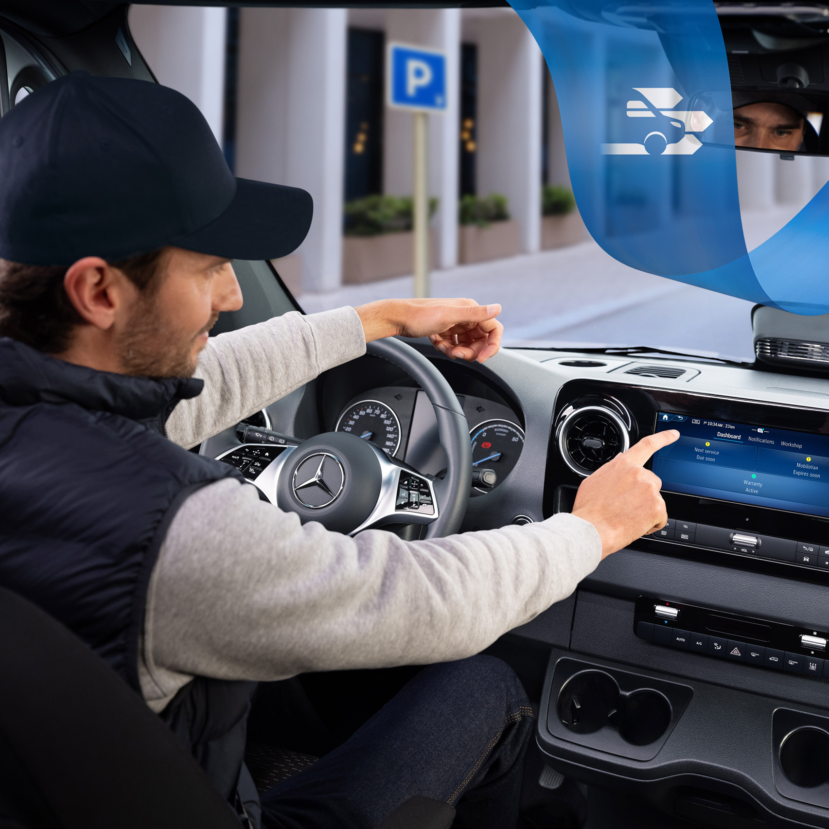 Mercedes-Benz | Technologie des utilitaires légers | OSA Le conducteur utilise Mercedes-Benz Service App dans le véhicule pour prendre et gérer facilement les rendez-vous de service.